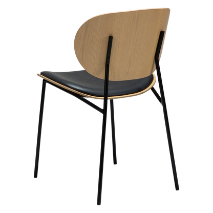 [var:Bezug=Raben-schwarzes Kunstleder und weißgewaschenes Eichenholz mit schwarzen Metallbeinen] CLEMENTINA Stuhl