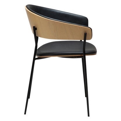 [var:Bezug=Raben-schwarzes Kunstleder und weißgewaschenes Eichenfurnier mit schwarzen Metallbeinen] CRIB Sessel