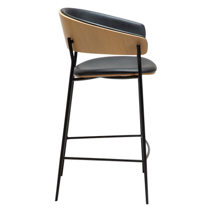 [var:Bezug=Raben-schwarzes Kunstleder und weißgewaschenes Eichenfurnier mit schwarzen Metallbeinen] CRIB Thekenhocker